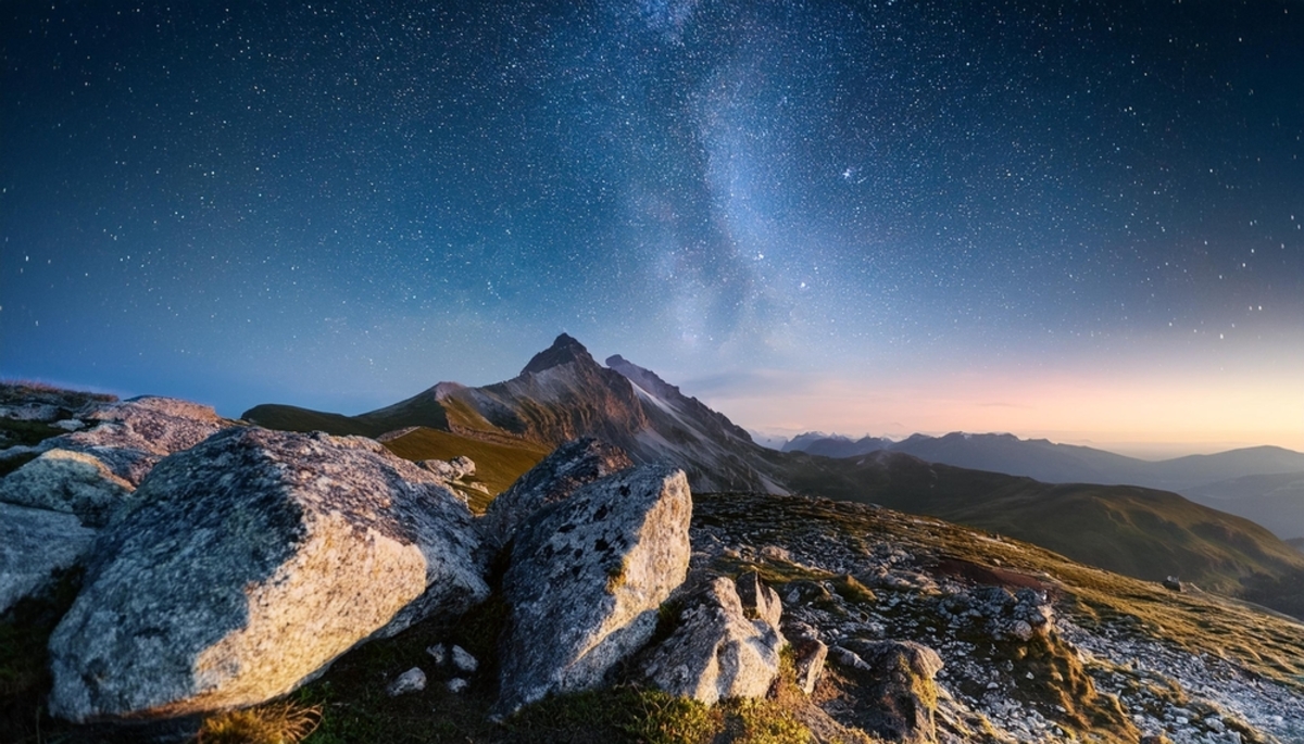 Sternenhimmel mit Felsen im Hintergrund | Luminar Neo Blog