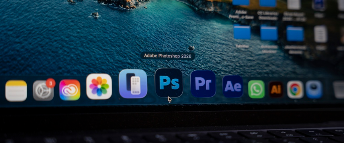 macOS Dock mit Tooltip Adobe Photoshop 2026 neben Premiere, After Effects und Illustrator Icons | Luminar Blog